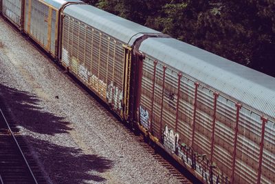 High angle view of railing on footpath