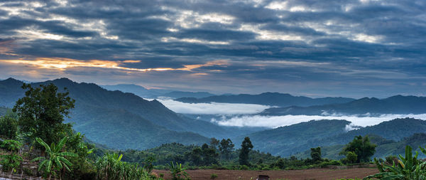 Scenic view of mountains against sky during sunset