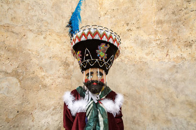 Portrait of a man with red umbrella