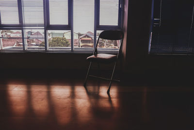 Man sitting on chair at home