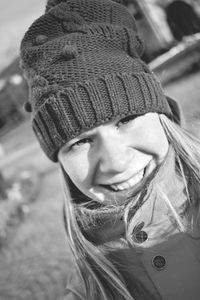 Close-up of young woman wearing hat