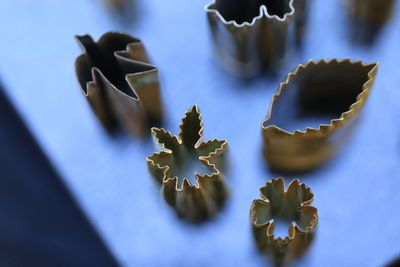 High angle view of cookie cutters on table