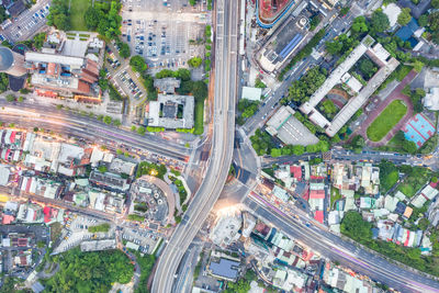 High angle view of street amidst buildings in city