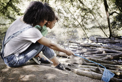 Mother with son playing with net