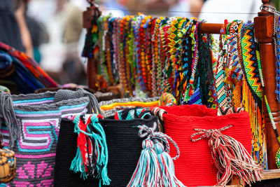 Hand made traditional colombian mochilas and necklaces at caldas square in the centerof popayan