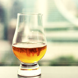 Close-up of beer in glass on table