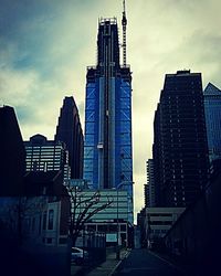 Low angle view of skyscrapers against sky