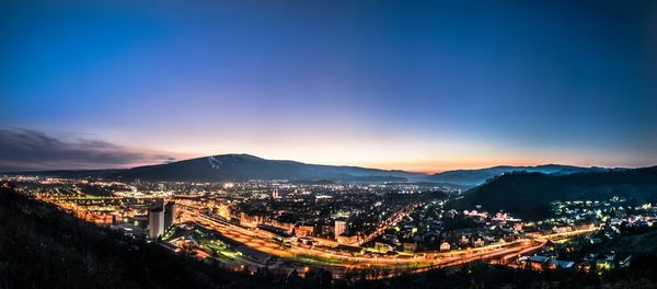 Illuminated cityscape at night