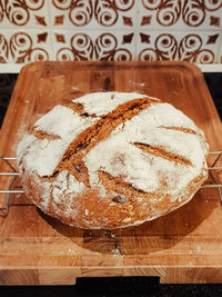 High angle view of bread on cutting board