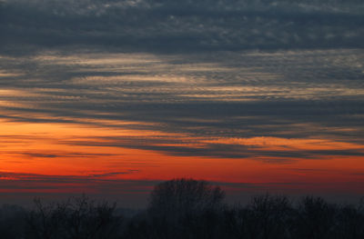 Scenic view of dramatic sky during sunset