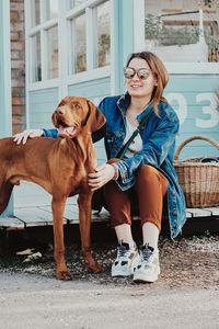 Portrait of woman with dog