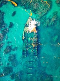Aerial view of abandoned ship in sea