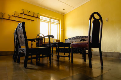 Empty chairs and tables at home