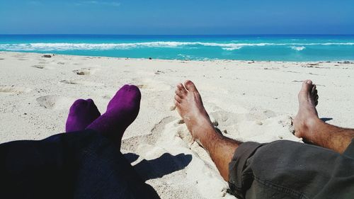 Low section of people on beach