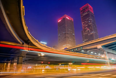 Light trails on city street at night