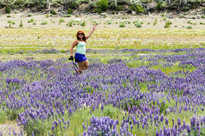 Full length of woman standing on field