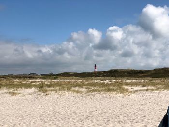 Scenic view of beach against sky