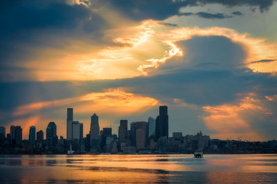 Seattle cloudscape. dramatic clouds forming just after sunrise over elliott bay. seattle, washington