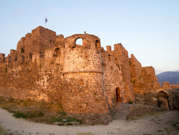 Low angle view of fort against clear sky