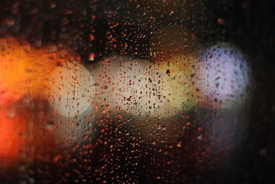 Full frame shot of wet glass window