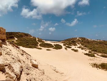 Scenic view of beach against sky