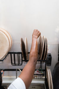 Woman washing her pottery at the ceramics studio