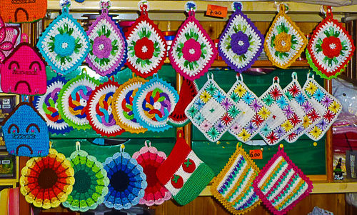 Multi colored decorations for sale at market stall