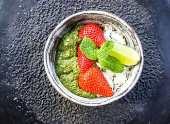 High angle view of strawberries in bowl