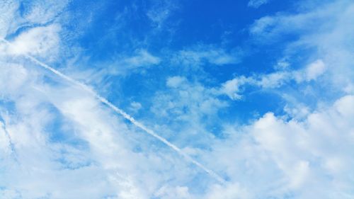 Low angle view of vapor trail in sky