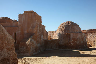 Old ruins against clear blue sky