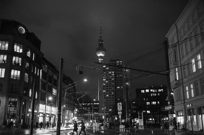 Low angle view of illuminated buildings at night