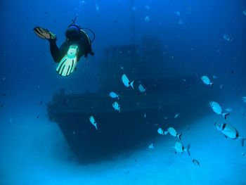 People swimming in sea