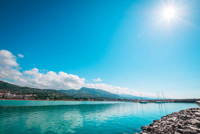 Scenic view of bay against sky