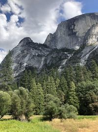 Scenic view of landscape and mountains against sky