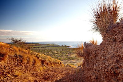 Scenic view of land against sky