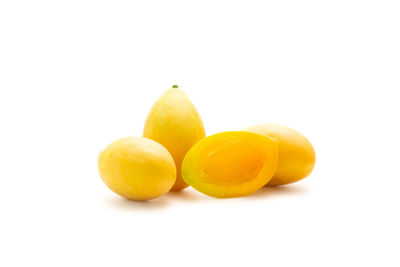 Close-up of oranges against white background