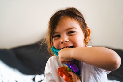 Portrait of cute girl at home