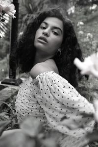 Portrait of beautiful young woman looking away