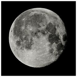 Low angle view of moon against sky