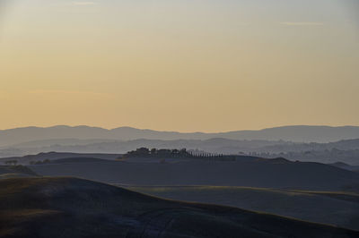 Scenic view of mountains against sky during sunset