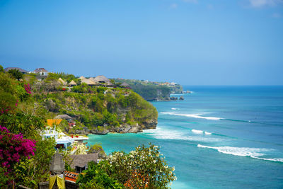 Scenic view of sea against clear blue sky