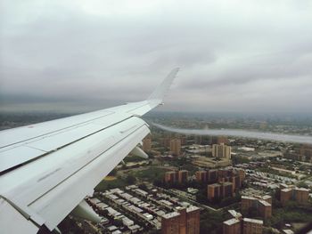 Aerial view of city against sky