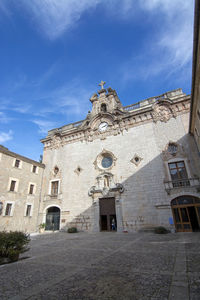 Low angle view of historic building against sky