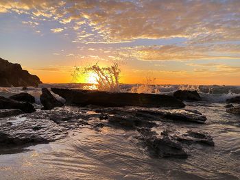 Scenic view of sea against sky during sunset