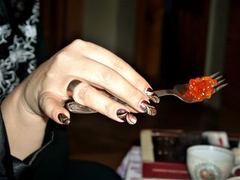 Close-up of woman holding ice cream