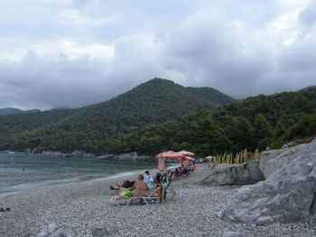 Scenic view of sea against cloudy sky