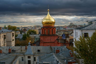 High angle view of buildings at red square against cloudy sky