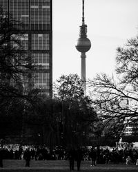 View of communications tower and buildings in city