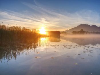 Romantic mountain lake view. the mountain lake with dock and boat house