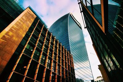 Low angle view of modern buildings against sky